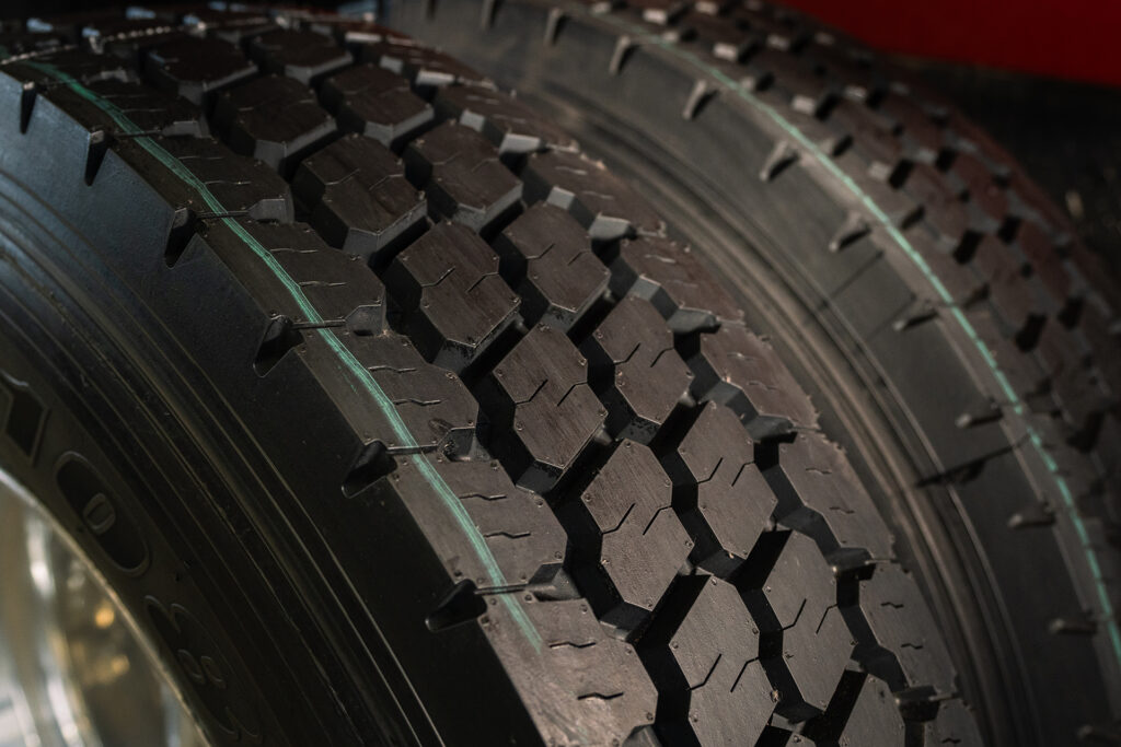 Two remanufactured AcuTread® tires are installed on a semi-truck.